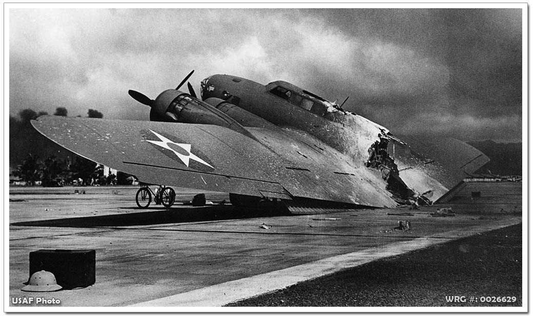 Boeing B-17C Flying Fortress/40-2074 near Hangar 5, Hickam Field, Oahu, Hawaii, on December 7, 1941.